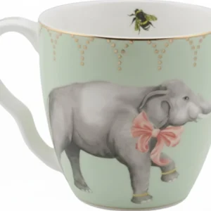 Tazza Yvonne Ellen in Porcellana Bone China di colore verde menta, con un grande elefante che indossa un fiocco rosa disegnato sul corpo e un'ape all'interno; presenta bordi dorati.