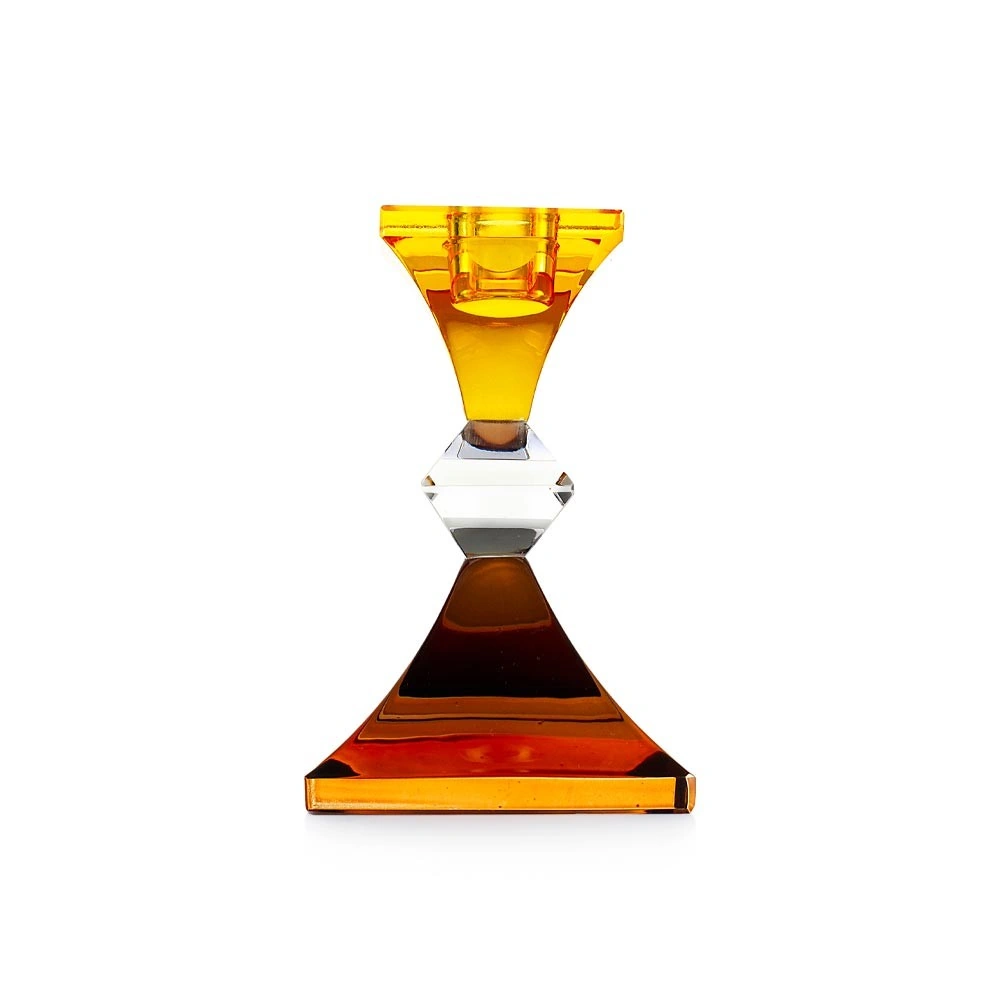 Candeliere in cristallo colorato ambra linea Ghiaccio di Emò Italia con design sfaccettato.